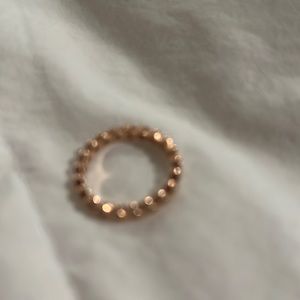 Rose gold ring with small diamonds